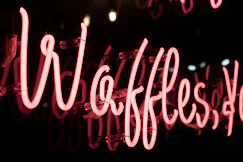 a neon sign that reads wifflefeste