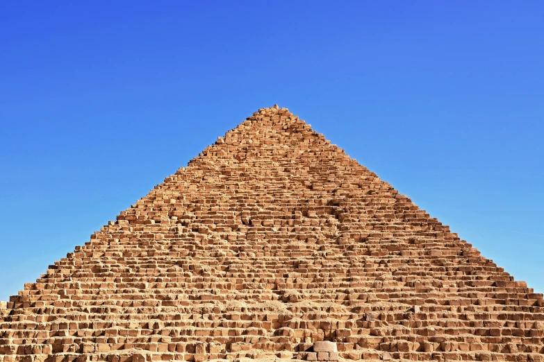 the pyramid is very large and has many steps to climb