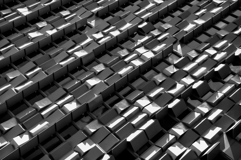 a very large black structure made up of rows of smaller blocks