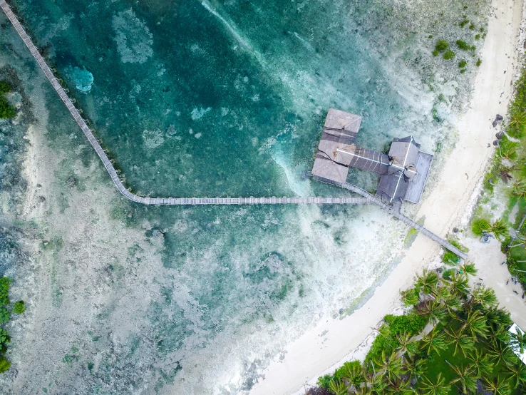 an aerial s of the resort on the coast