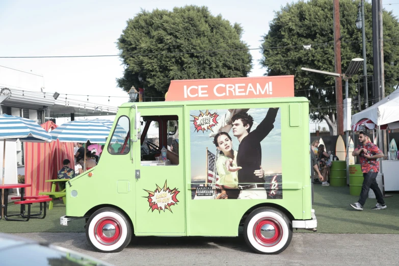 an ice cream truck parked on the road