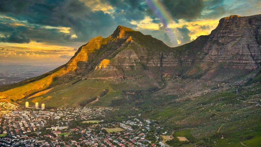 an aerial view of the mountains and the city