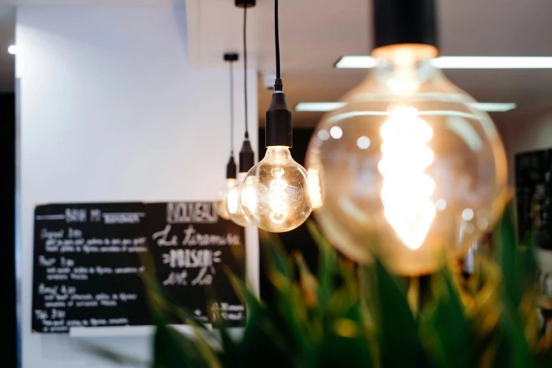 a group of light bulb hanging from a ceiling