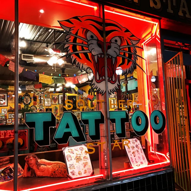 an asian style tattoo shop front display window