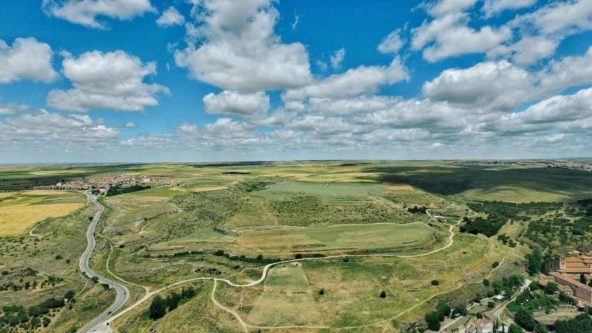 an aerial view of the countryside and town