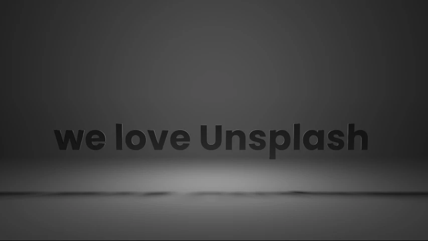 the words we love unsplish on a black background
