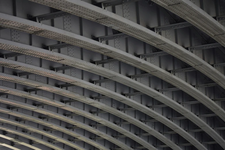 a large metal structure that is attached to another building