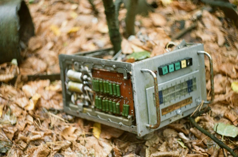 there is an old and broken radio in the woods