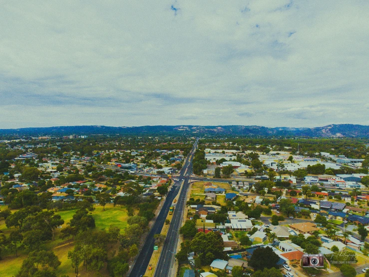 aerial view of a town that has cars and buildings