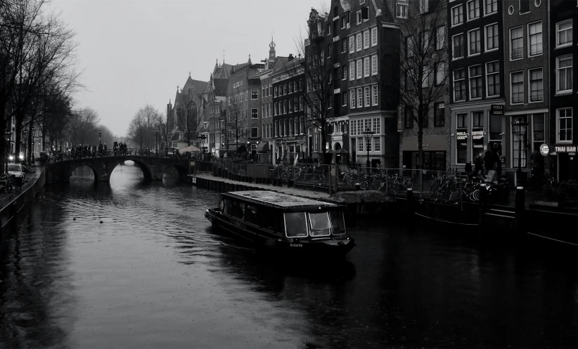 the view of a canal and buildings on the sides of it