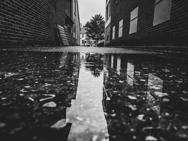 water reflecting on the ground in a small town