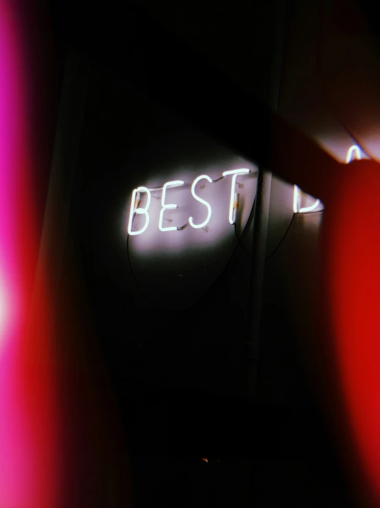 a sign saying the best is in a dark room