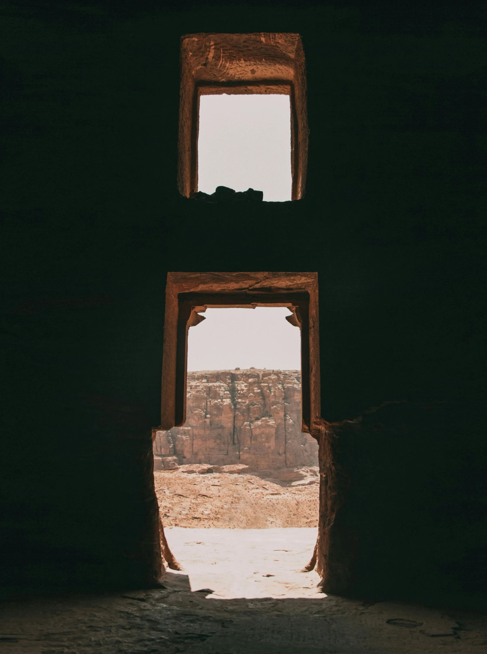 the inside of a building with an open doorway