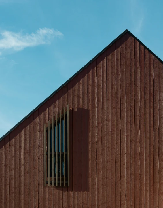 a window on a wooden building