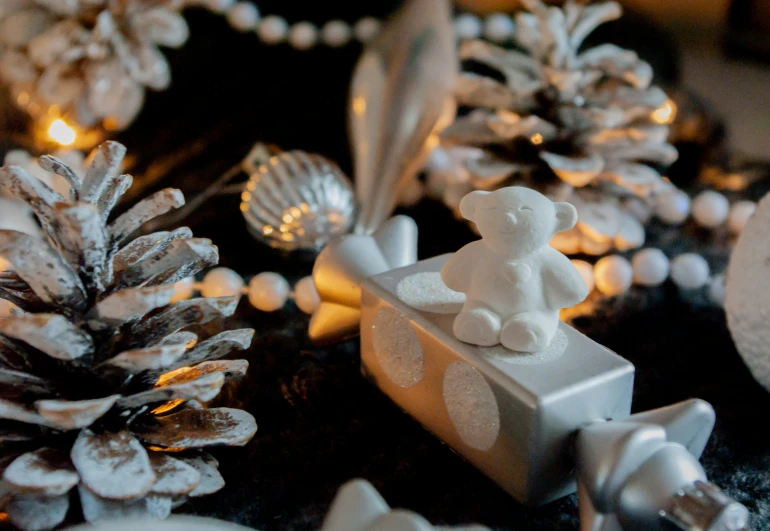 a close up of many pine cones and small figurines