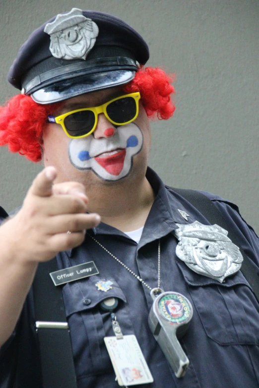 a person dressed in a police uniform with clown hair
