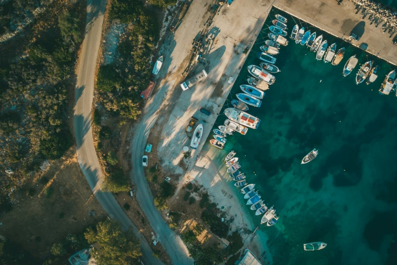 a marina in the ocean with various boats