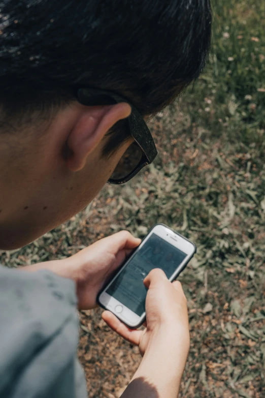 an image of a person using their phone