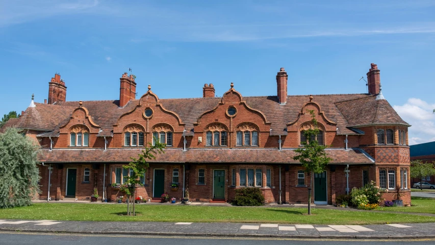 a big red brick building with many windows