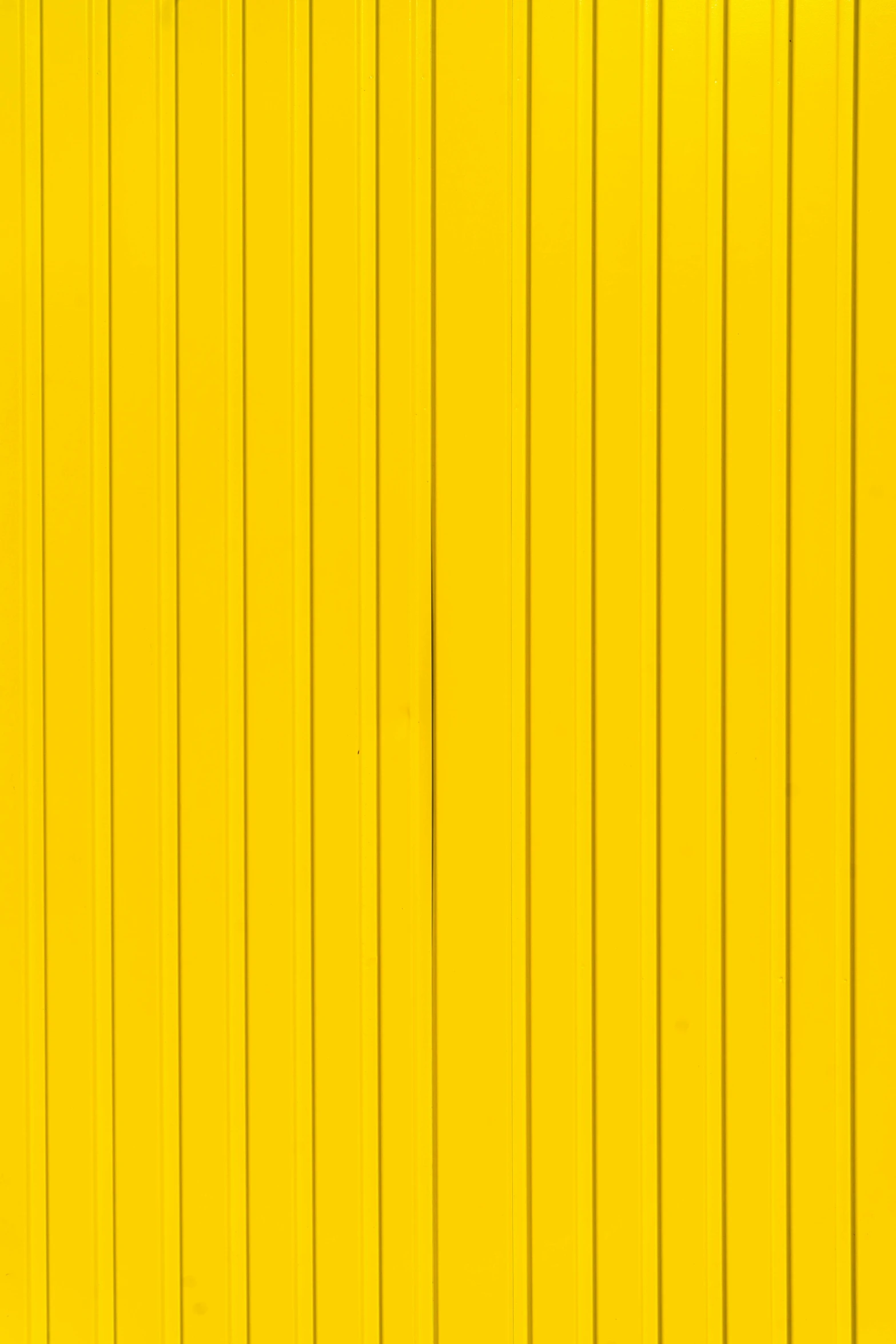 the image is of yellow painted on a wall