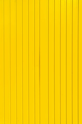 the image is of yellow painted on a wall