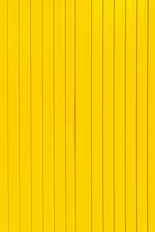 the image is of yellow painted on a wall