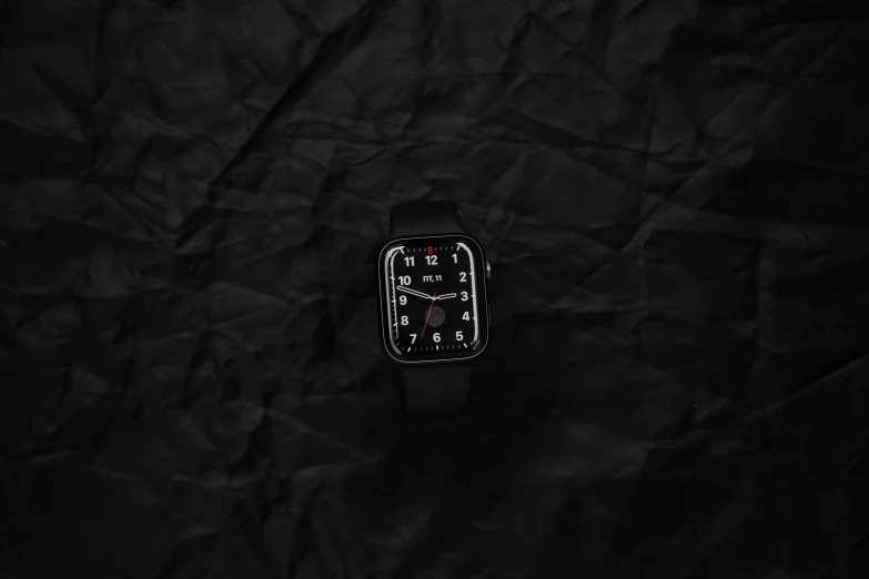 a phone on the table with a dark background