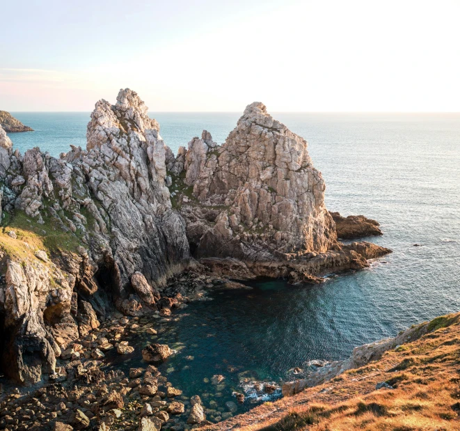 there are some very big rocks out in the water