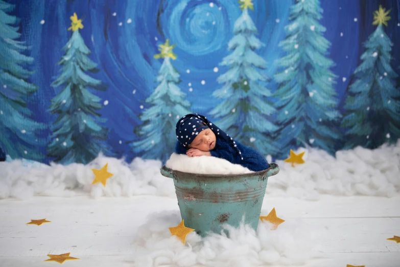 an image of a baby in a bucket