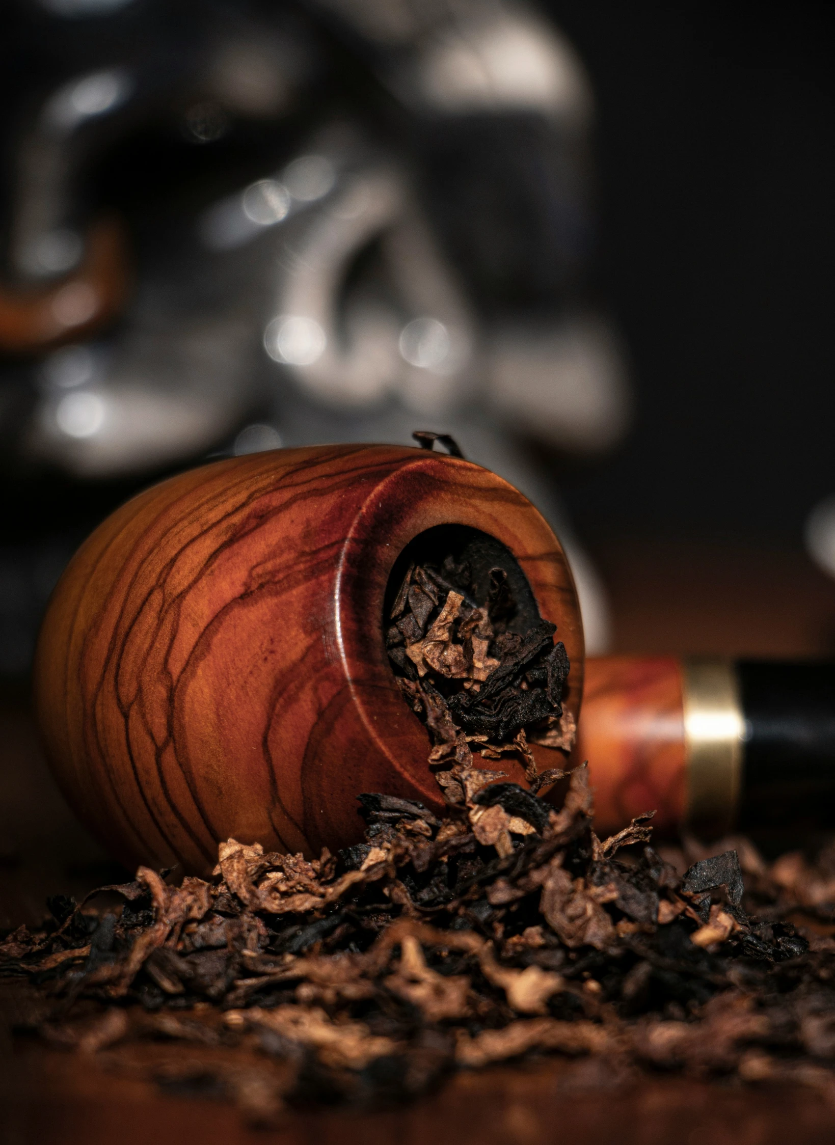 a pipe and ash catcher on top of a table