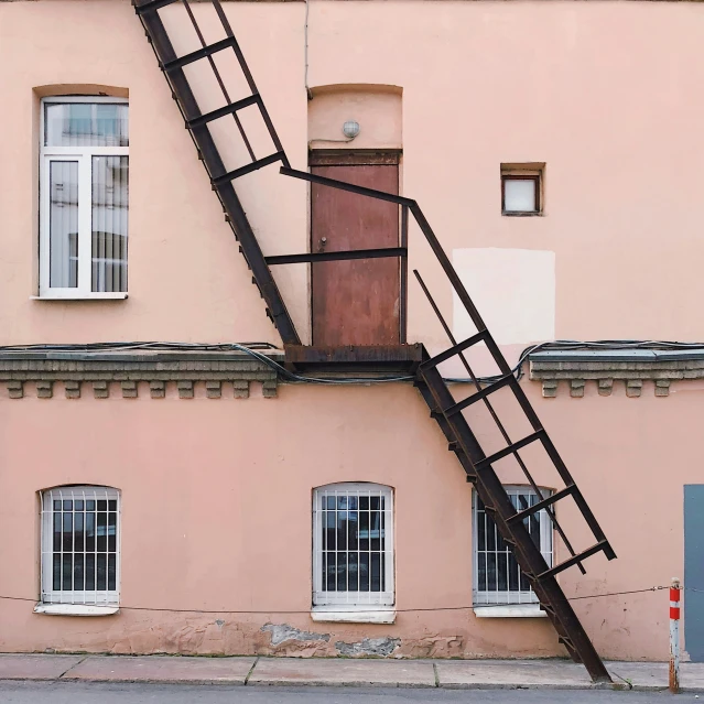 a staircase going up the side of a building