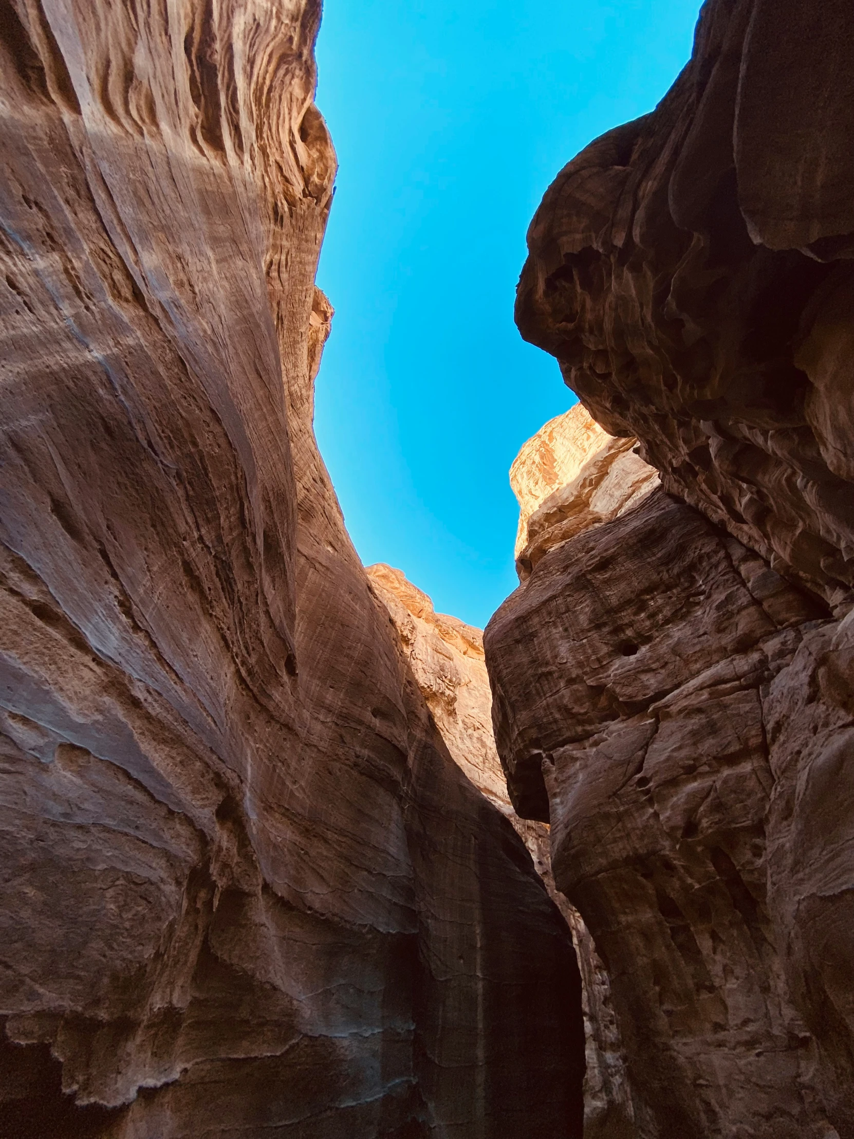 the side of a very narrow, rocky canyon