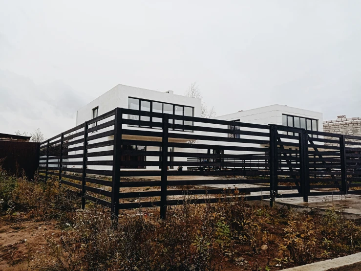 multiple large wooden posts that are on the ground