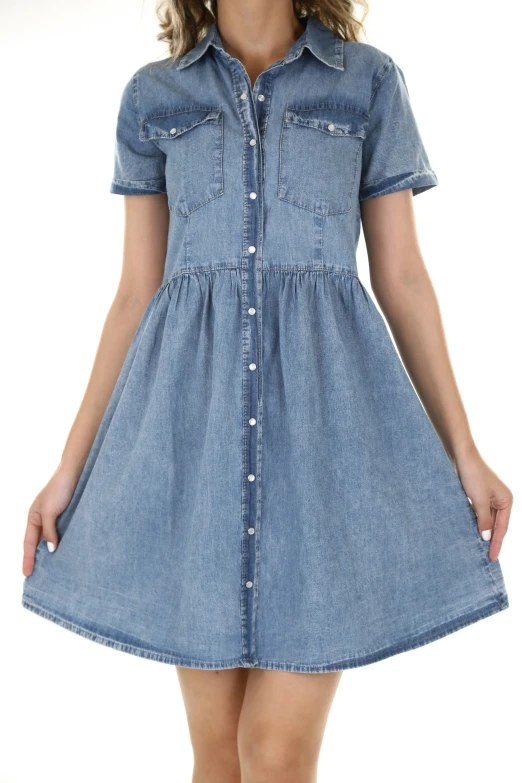 a young woman wearing a short denim dress