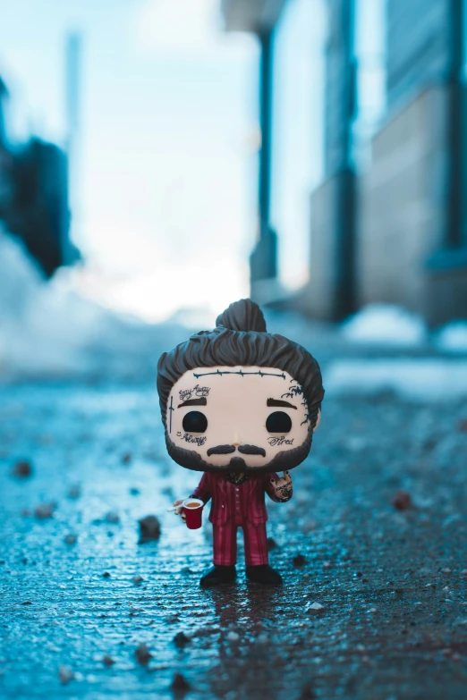 a small toy figure is standing on the street
