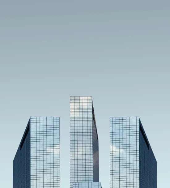 a couple of tall buildings on top of a road