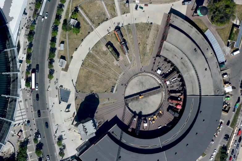 an overhead view of an airport with parked cars