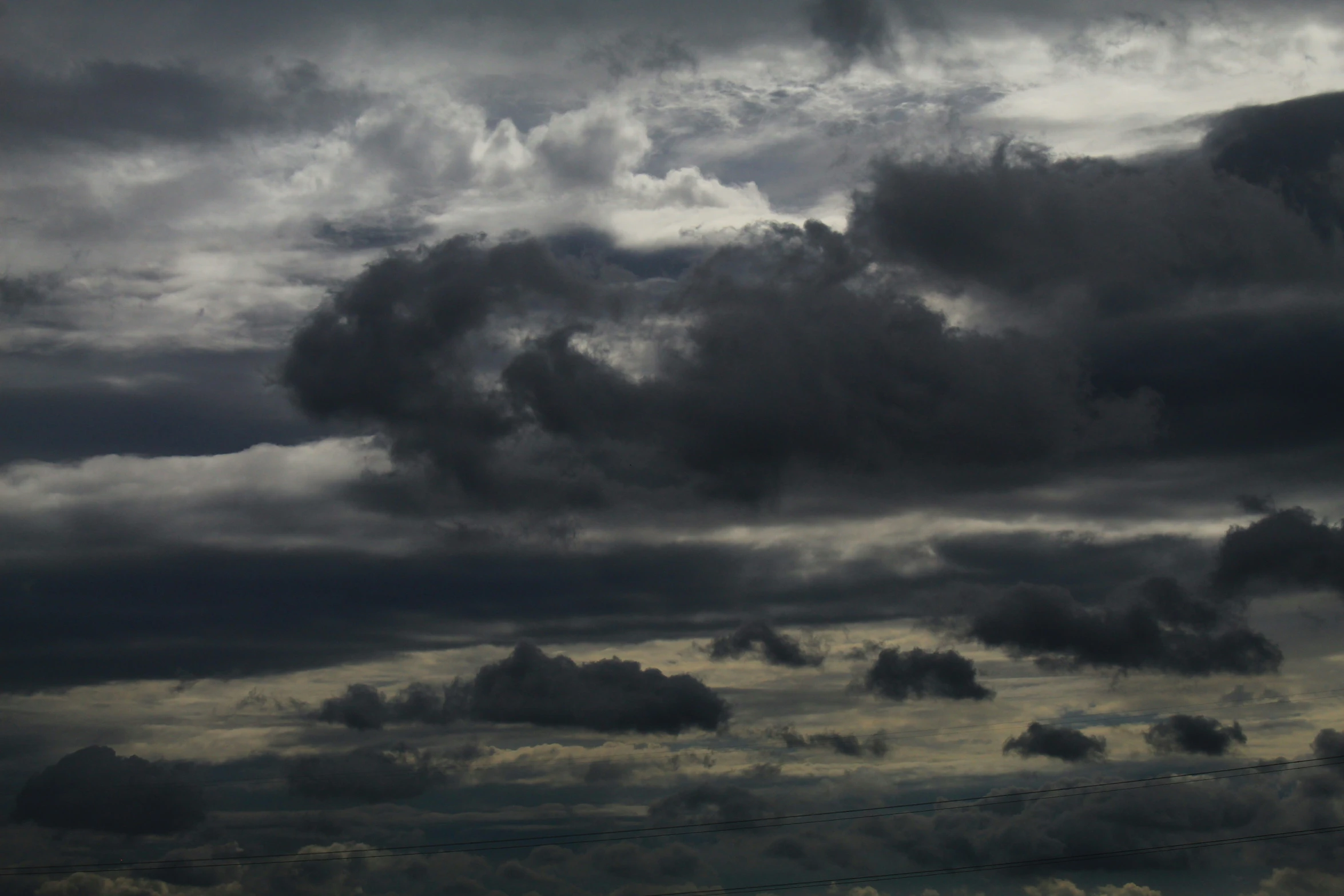 a cloudy sky with the sky almost obscured by the clouds