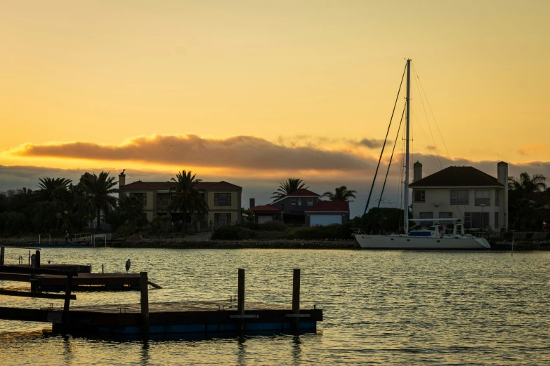 a boat out on the water in a beautiful setting