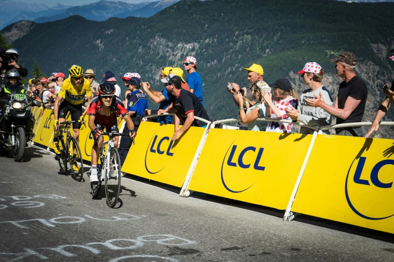 people riding their bikes around an obstacle course