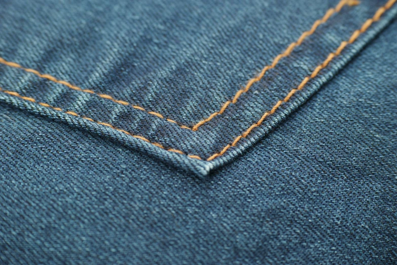 a close up po of the side and stitching of a jeans pocket