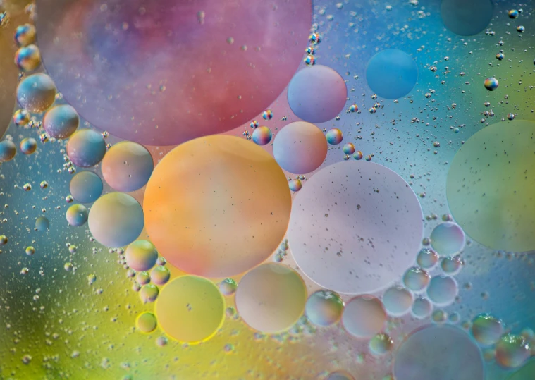 a colorful po with bubbles and drops