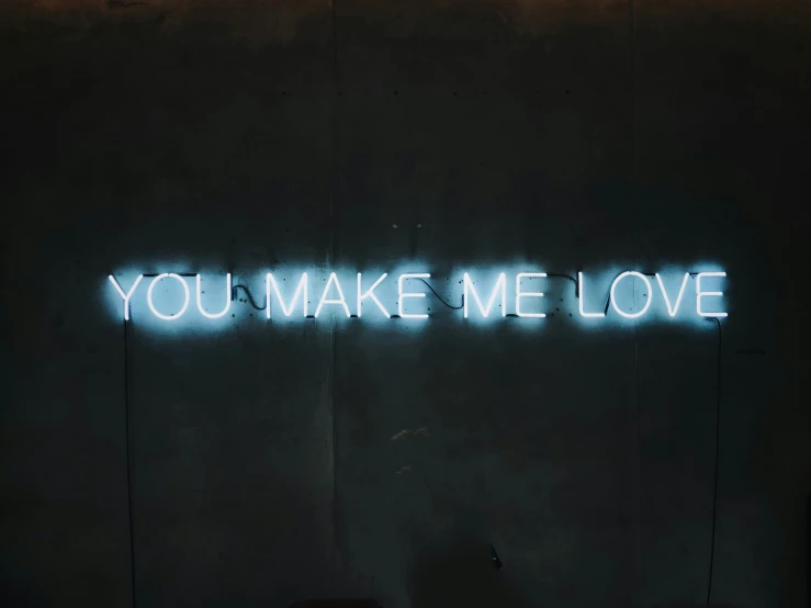 a neon sign that reads you wake me love