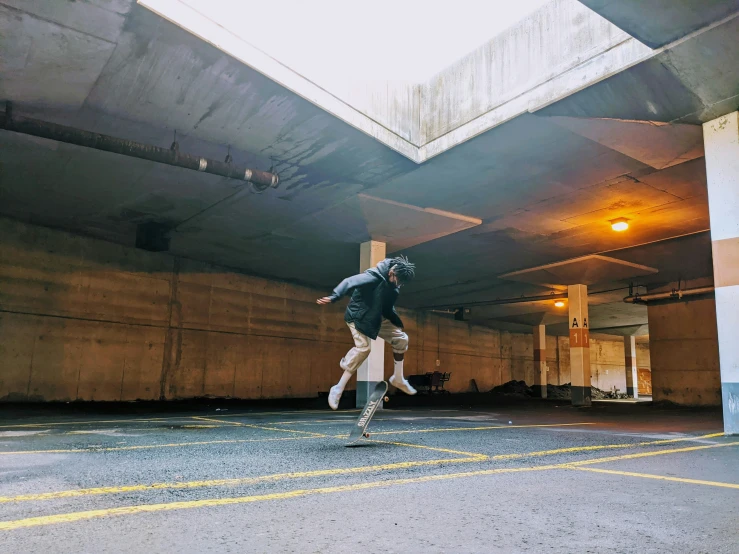 the man is doing tricks on his skateboard