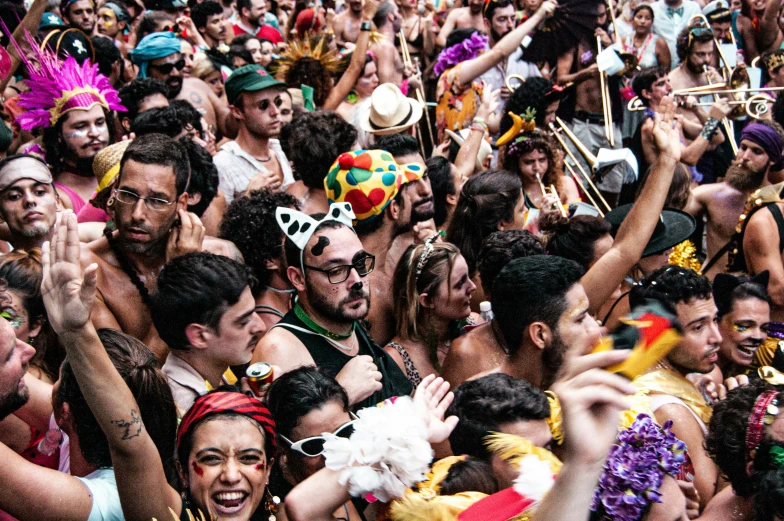 many people gathered at a carnival party