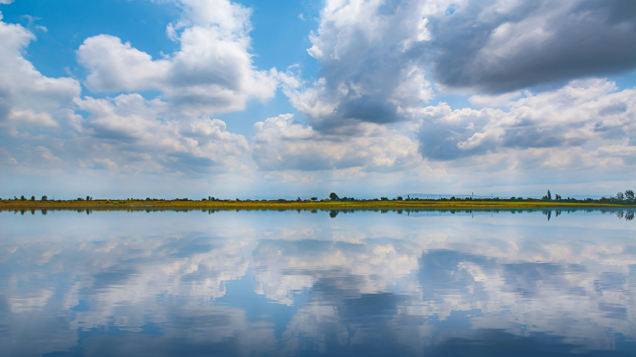 there are clouds reflecting in the water