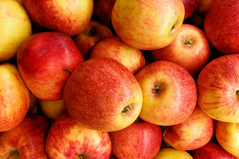 an apple is shown in the middle of a large pile