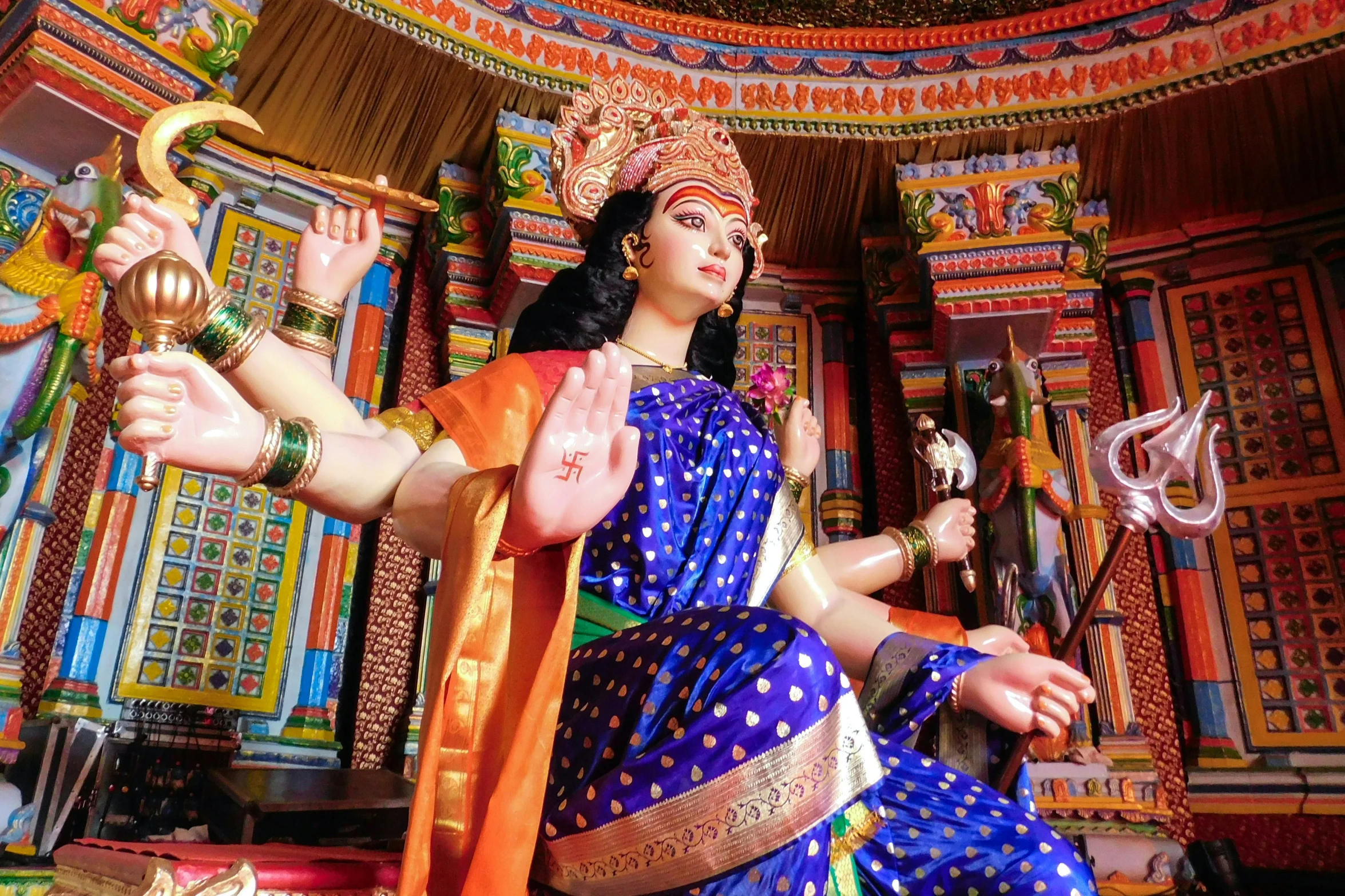 hindu statue of goddess god with arms raised