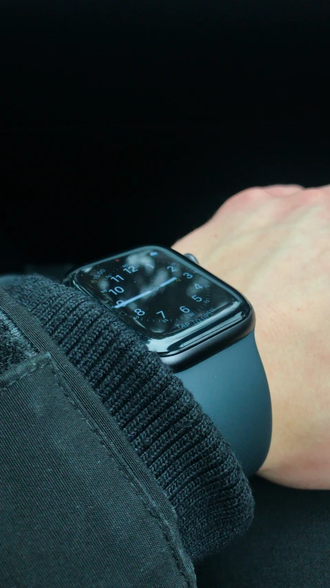 a man's hand with a wrist and an apple watch