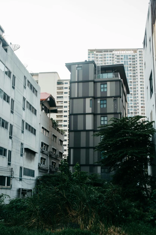 some very large buildings near one another in the city